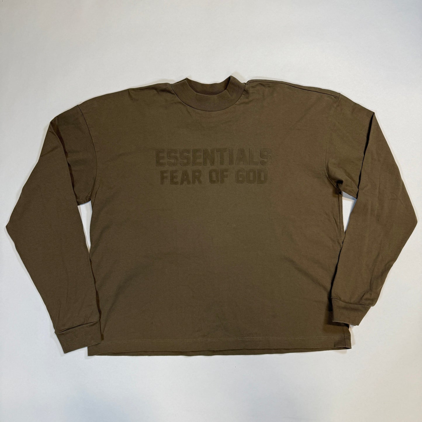 Essentials Fear of God Wood Long Sleeve Tee, Earthy-toned long sleeve tee in "Wood" from Essentials Fear of God. Oversized silhouette with a clean and modern aesthetic.