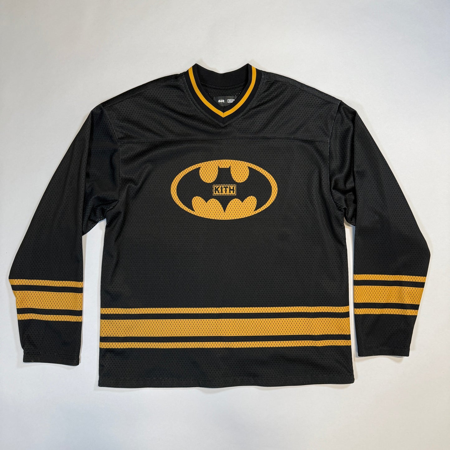 Kith x Batman Long Sleeve Malik Jersey Black, Kith x Batman long sleeve jersey in black. Premium design with unique details inspired by the Dark Knight.