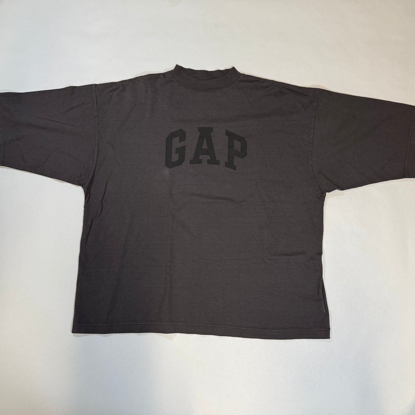 Yeezy Gap Engineered by Balenciaga Dove 3/4 Sleeve Tee, Yeezy Gap Balenciaga collab 3/4 sleeve Dove tee. Oversized fit with signature minimalist branding.