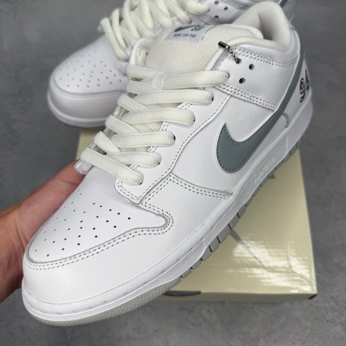 Nike SB Dunk Low Supreme 94 White Metallic Silver - Kicks Collective PA - Nike - HQ8487 - 100 - Men's Shoes - 10M/11.5W - Brand New