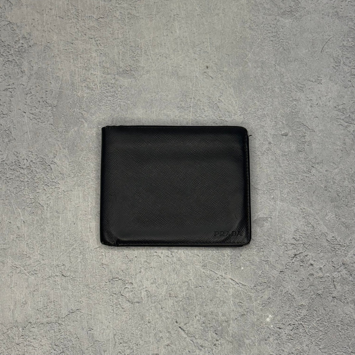 Prada Black Saffiano Leather Bi Fold Wallet W/ Grey Interior - Image 1