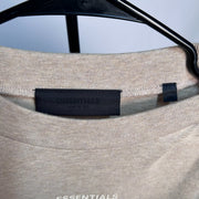 Fear of God Essentials Tee Gold Heather